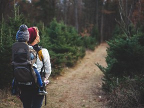 woman hiking with child