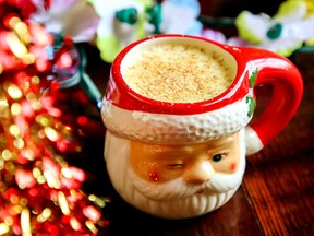 A cocktail mug shaped like Santa