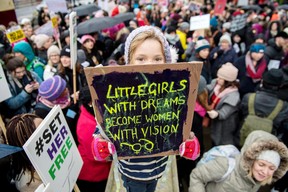 Orla Dean, 5, holds a placard during a Time’s Up rally in London, England.