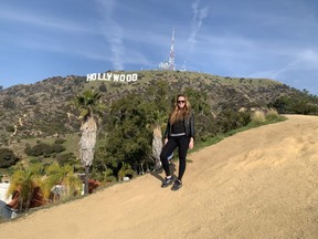 Bikes and Hikes LA guide Elizabeth Conway at the quintessential spot to photograph the Hollywood sign.