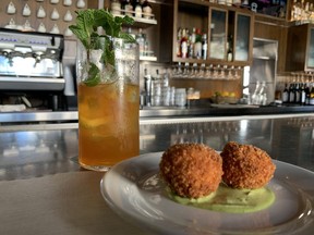 Savannah red rice balls and green goddess dressing at The Grey's diner bar.