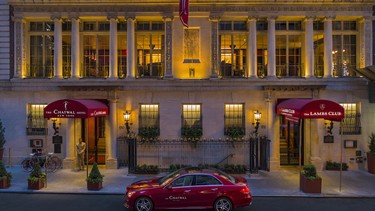 The grand facade (and hotel car) at dusk