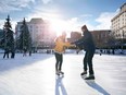 couple ice skating outdoors