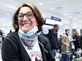 Mihaela Dajbog is all smiles after her arrival at Trudeau Airport on the last Air Canada flight from Rome.