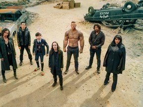 The cast of The Umbrella Academy (left to right): Robert Sheehan, Justin H. Min, Aidan Gallagher, Ellen Page, Tom Hopper, David CastaEda, and Emmy Raver-Lampman.