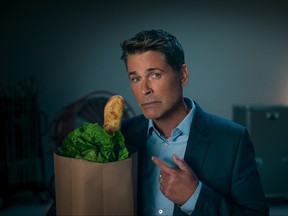 Rob Lowe demonstrates the old baguette-in-the-grocery-bag trope.