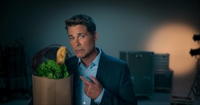 Rob Lowe demonstrates the old baguette-in-the-grocery-bag trope.