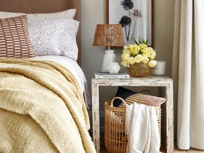 Layers of soft, muted neutral colours create a soothing guest room. Mother of Pearl Side Table, $199, www.marshalls.ca.