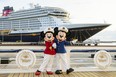 Minnie and Mickey Mouse are welcoming passengers onto the Disney Wish in Port Canaveral, Fla.
