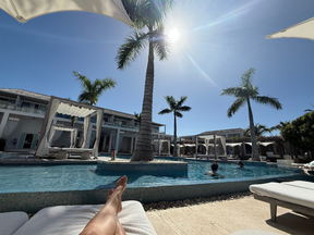 Enjoying a meal poolside.