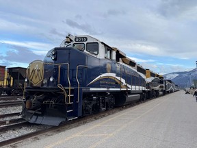 The dark blue exterior of the Rocky Mountaineer train