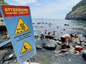 The sign warning visitors about how hot the water can get.
