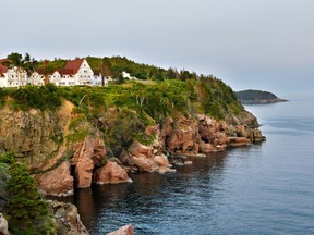 Coastal cliffs overlook the sea in Ingonish, Cape Breton Island.