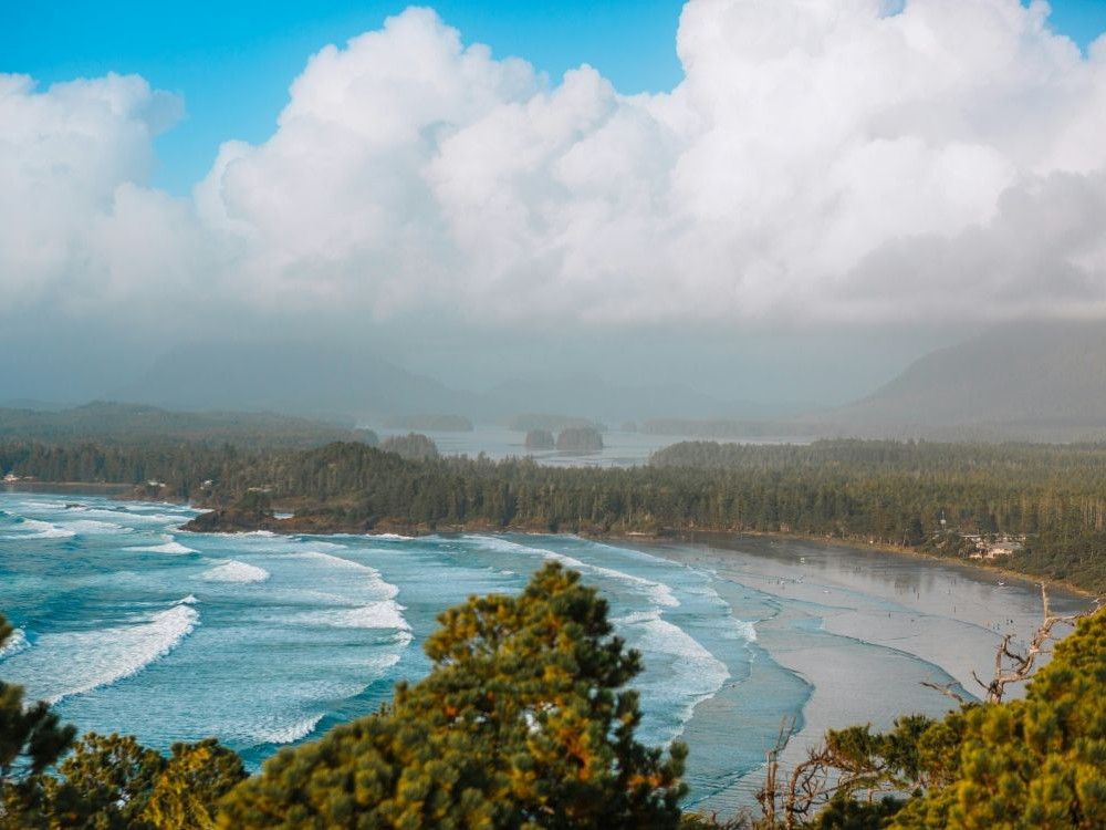 A view from a hill overlooking Cox Bay in Tofino, named one of the best islands in Canada by Travel + Leisure.