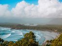 A view from a hill overlooking Cox Bay in Tofino, named one of the best islands in Canada by Travel + Leisure.
