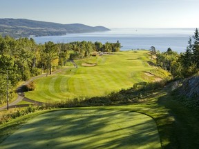 One of the most dramatic drives on Canada's golf scene — the opening tee-shot on the St-Laurent Nine at Fairmont Le Manoir Richelieu, a historic resort that hangs over the St. Lawrence River.