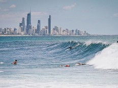 The renowned retail and resort area of Surfers Paradise is the backdrop for wave chasers in Australia's Gold Coast.
