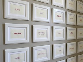 Detail from "How Would Mary Feel?", an installation of 100 cross-stitched, derogatory words for woman, at Wall Space Gallery in Ottawa. (Photo courtesy the gallery.)