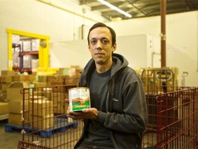 Ottawa Food Bank warehouse co-ordinator Travis Glavich is shown inside the organization’s warehouse. Last week, the food bank put out a request for additional donations. The call is being heard.