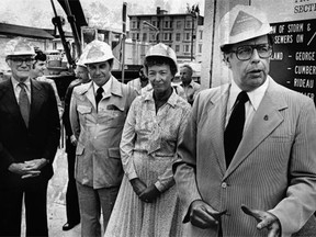 Walter Baker, former MP for Nepean-Carleton (far right), was one of those seen as having pushed for the full-scale development of a new city of 100,000 south of Ottawa. After the provincial cabinet overruled the Ontario Municipal Board, paving the way for the expansion, mayor Marion Dewar (second from right), said: “I’m absolutely shocked.”