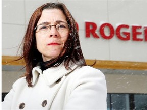 Karen Peters stands outside a Rogers outlet in Barrhaven, where she was treated very poorly, she says, by an employee there.