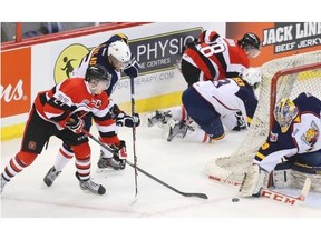 Barrie goaltender Mackenzie Blackwood makes the save on Brendan Bell of the Ottawa 67’s as the Colts’ Aaron Ekblad tries to defend during first-period OHL action Thursday night at Canadian Tire Centre. The 67’s dropped a 5-3 decision.