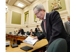 Chief electoral officer Marc Mayrand arrives at the Commons house affairs committee in Ottawa on Tuesday May 28, 2013. THE CANADIAN PRESS/Adrian Wyld