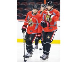 Clarke MacArthur (L) and Bobby Ryan (R) skate together while their line mate Kyle Turris is seen in the background as the Ottawa Senators practice at Canadian Tire Centre earlier this season. (Wayne Cuddington / Ottawa Citizen)