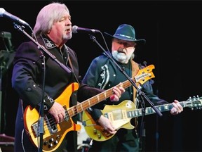The Cooper Brothers (Brian, left, and Dick, right) performed a 40th anniversary concert to a packed house at Centrepointe Theatre Friday night.
