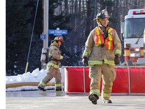 Firefighters battle a blaze which razed a home at 109 Topol Lane off Huntmar Rd. in Carp (Ottawa), Sunday, March 23, 2014.