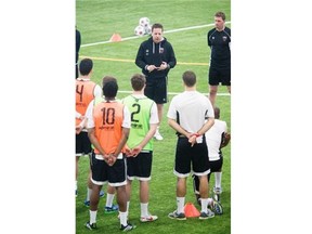 Fury Coach Marc Dos Santos (centre top). Ottawa Fury FC, a North American Soccer League expansion franchise, conducts first workout of first training camp at the Branchaud-Briere Complex, March 3, 2014.