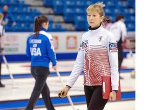 Karri Willms, a Canadian coaching with the Latvia team, is seen at the world women’s curling championship at Saint John, N.B. on Sunday. Willms competed for Canada in the 1991 world championship at Winnipeg and the Albertville Olympics in 1992, when curling was a demonstration sport.