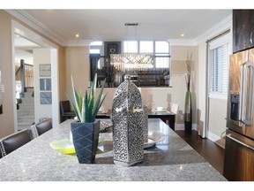 The kitchen, with a view to the upstairs family room in the Lily, one of the new models by Mattamy Homes in Monahan Landing.