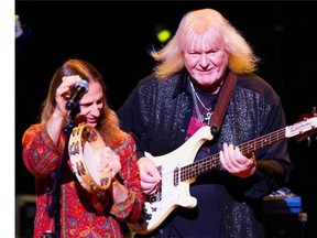 Lead vocalist Jon Davison and bassist Chris Squire with the progressive rock band YES performing Close To The Edge during a concert at the Queen Elizabeth Theatre, Vancouver, March 20 2014.