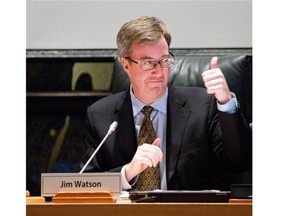 Mayor Jim Watson giving a thumbs up immediately after the unanimously supported vote for Ottawa’s Light Rail Transit Project at at City Hall in Ottawa, December 19, 2012.  (Garth Gullekson / The Ottawa Citizen / Postmedia News)