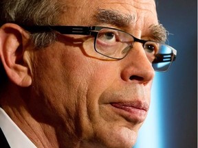 Minister of Natural Resources Joe Oliver pauses while announcing new rules for pipelines and financial penalties for individuals and companies that violate environmental laws, during a news conference in Vancouver, B.C., on Wednesday June 26, 2013.