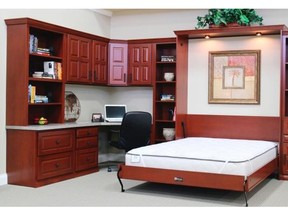 A Murphy bed that’s ready for an overnight guest. The beds are designed to accommodate standard mattresses.
