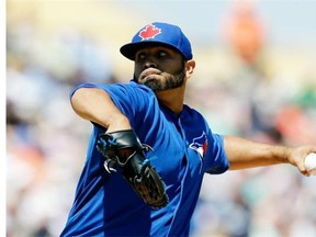 Toronto Blue Jays starting pitcher Ricky Romero throws during the first inning of a spring exhibition baseball game against the Detroit Tigers in Lakeland, Florida on Tuesday.