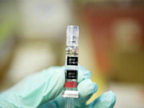 A nurse loads a syringe with a vaccine against hepatitis at a free immunization clinic for students before the start of the school year,  in Lynwood, California August, 27, 2013.  Nurses are immunizing children in preparation for the first day of public school on September 3. The clinic offers the mandatory vaccinations for school children against diphtheria, tetanus, pertussis, polio, hepatitis B,  MMR (measles, mumps, rubella) and chickenpox as well as some optional ones.  AFP PHOTO / Robyn BeckROBYN BECK/AFP/Getty Images