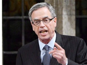 MP Joe Oliver responds to a question during Question Period in the House of Commons on Parliament Hill in Ottawa on Thursday, November 1, 2012. THE CANADIAN PRESS/Sean Kilpatrick