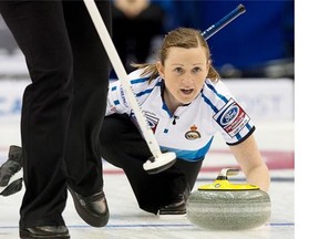 Scottish skip Kerry Barr delivers a rock against the United States in her team’s second-last game of the women’s world curling championship at Saint John, N.B.