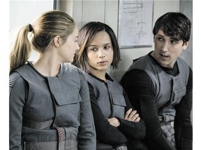 Shailene Woodley, left, Zoe Kravitz, and Ben Lloyd-Hughes are pals in Divergent.