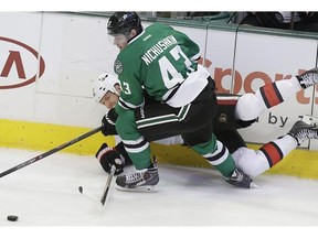 Ottawa Senators defenseman Marc Methot (3) is knocked to the boards by Dallas Stars right wing Valeri Nichushkin (43) during the third period of an NHL Hockey game, Saturday, March 22, 2014, in Dallas. The Stars won 3-1.