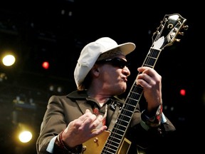 Sylvain Sylvain on stage with the New York Dolls, in a file photo. Sylvain was supposed to play Ottawa this week,with Glen Matlock of the Sex Pistols, but the show has been cancelled. (Photo by Kristian Dowling/Getty Images)