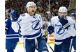 Tampa Bay Lightning centre Steve Stamkos (left) celebrates his second goal of the period with teammate Alex Killorn (right) during first period NHL action against the Toronto Maple Leafs in Toronto on Wednesday March 19, 2014.