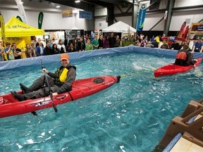 Testing kayaks at the annual Outdoor & Adventure Travel Show in Ottawa. Image courtesy shaughnessy photography
