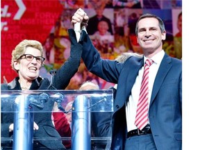 Then-premier Dalton McGuinty congratulates Kathleen Wynne after she became the new leader of the Ontario Liberal party last year.