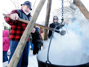 In this file photo, Colin ‘Tubby’ Stephens brews up some maple syrup the old-fashioned way. Producers say this winter’s steady cold has returned sap production and gathering to more traditional schedules.