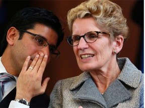 Yasir Naqvi, who was named community safety and correctional services minister this week after Premier Kathleen Wynne, right, announced a minor cabinet shuffle, repeated the government’s mantra when asked about the gas plant scandal: ‘We should let the police do an investigation and do their work’.