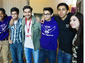 Actor/writer Vinay Virmani, third from left, poses with some students from Longfields-Davidson Heights Secondary School in Barrhaven.